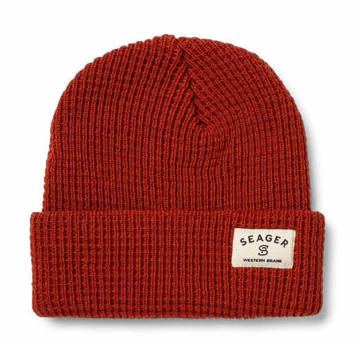 Rust Seager cuffed knit beanie with cream woven label