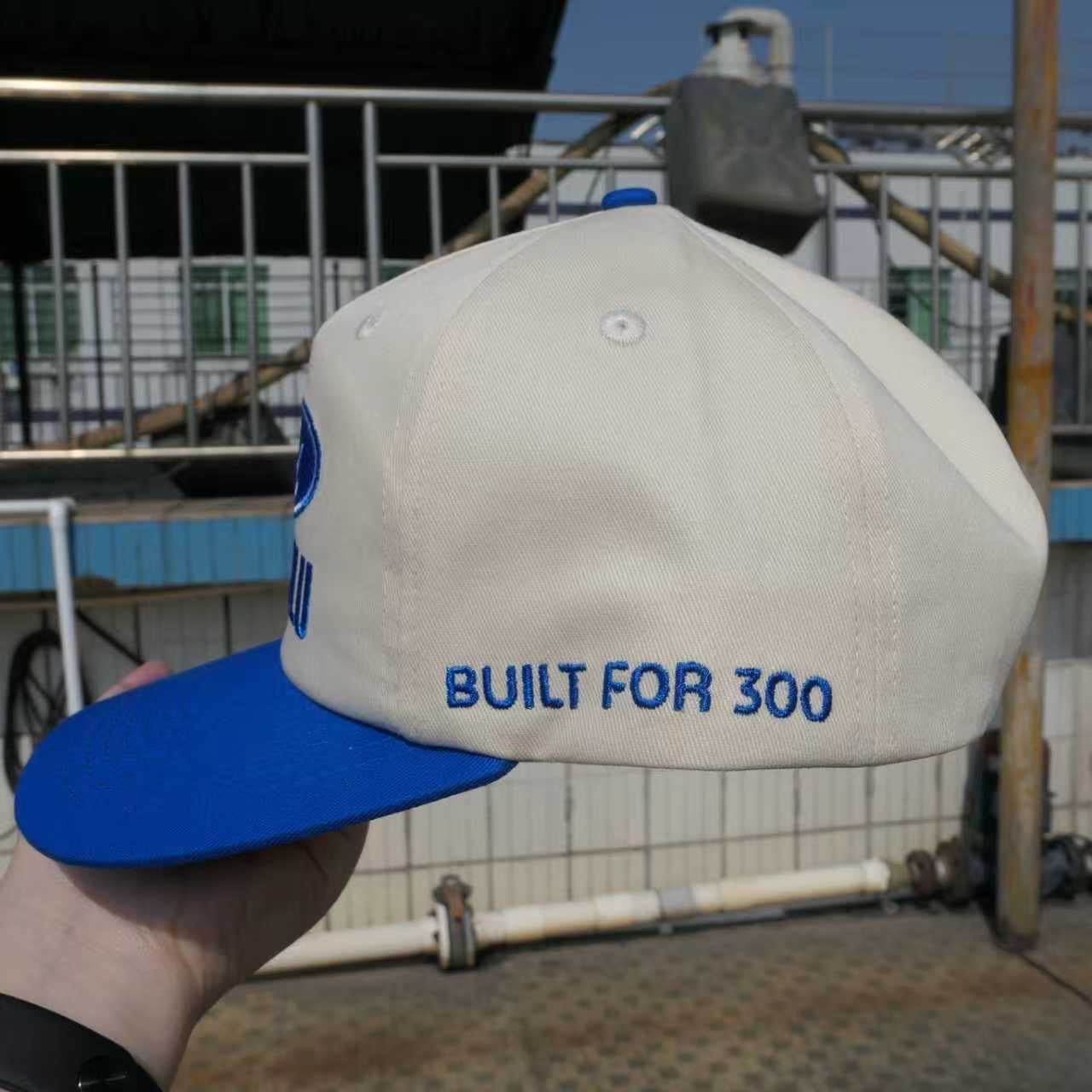 Cream and blue Honolulu Ford sample with Built for 300 side embroidery