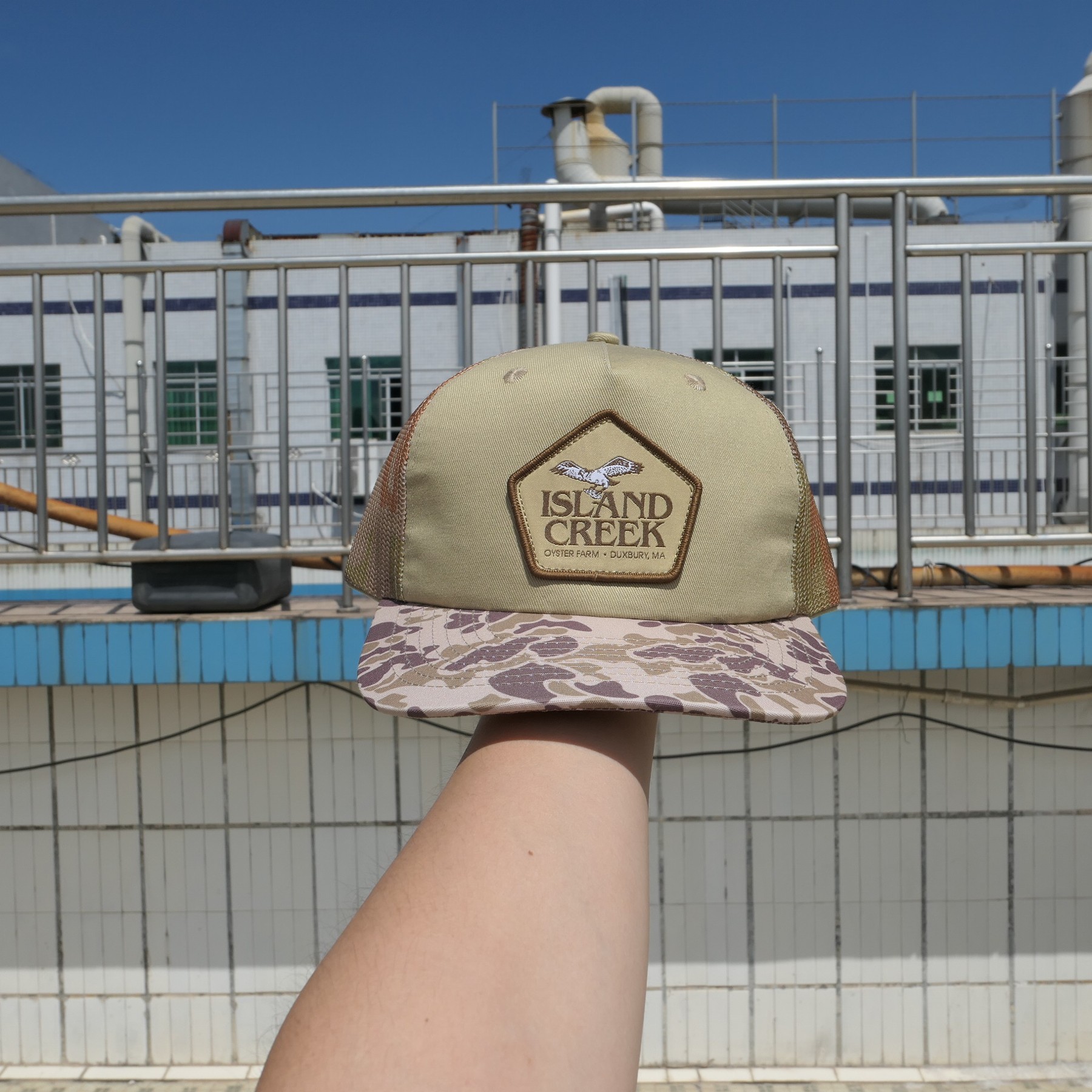 Island Creek duck-camo mesh cap with woven patch