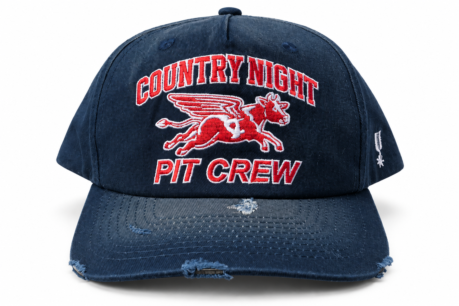 Country Night Pit Crew red and white embroidery on a distressed navy cap, photographed on white